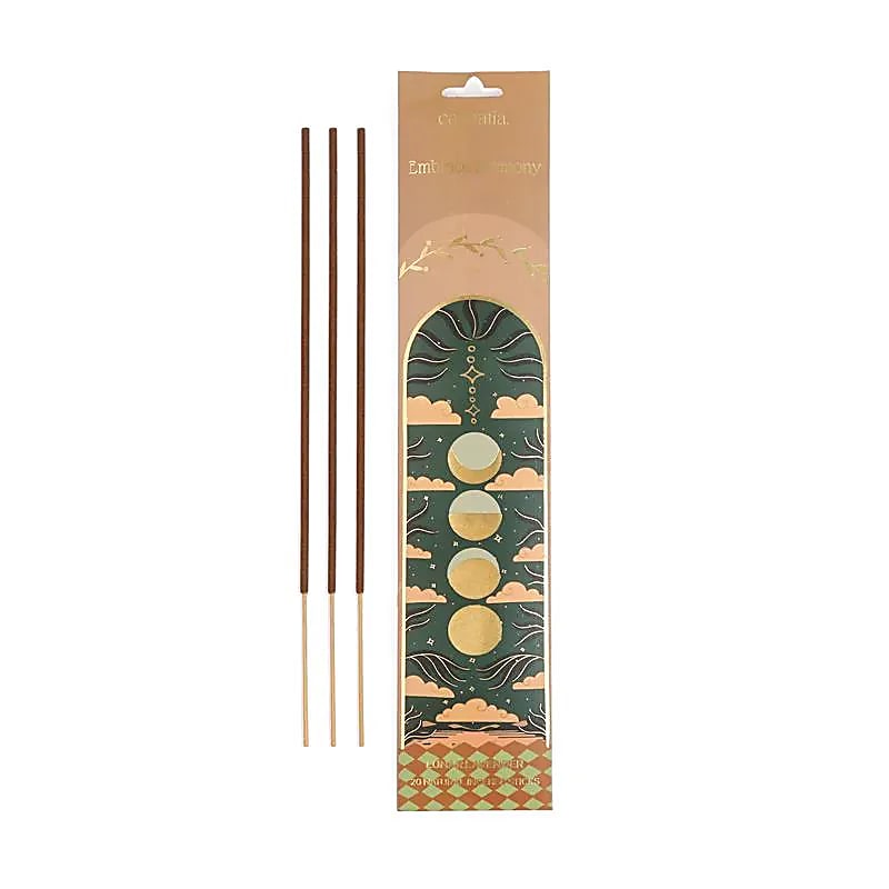 Boîte d'encens naturels Carnatia Embrace Harmony, design céleste vert et doré avec phases lunaires, accompagnée de trois bâtonnets d'encens