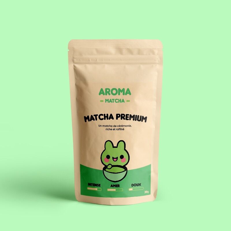 Sachet kraft refermable de thé matcha premium, Aroma Matcha avec dessin de tête de lapin vert et son bol de matcha, bienfaits en curseurs