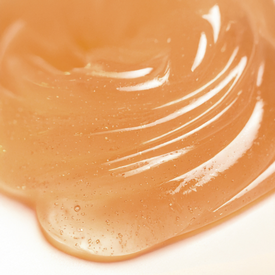 Texture gel fondant abricot du masque resplendissant Minimaliste
