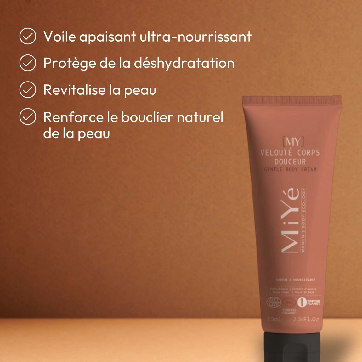 Visuel des bienfaits de la crème Velouté corps douceur, Miyé, tube ocre avec bouchon noir, sur fond ocre